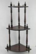A contemporary mahogany three-tiered cor