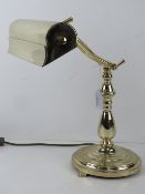 A brass banker's desk lamp with adjustable arm, a/f.