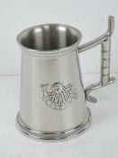 A Bullseye game show contestant's tankard standing 14cm high.