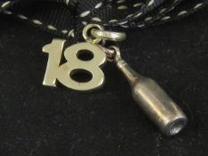 Links of London; two silver charms havin