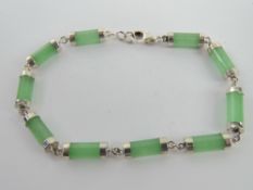 A 925 silver and jade bracelet measuring