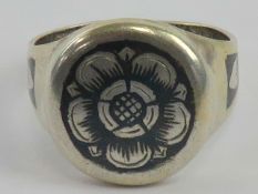 A silver niello floral signet ring, Russ
