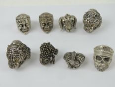 A quantity of white metal Gothic rings,