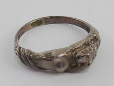 A silver mermaid ring, stamped 925, size