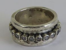 A worry ring (stress ring / fidget ring)