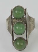 A 1970s style geometric three cabachon r