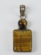A double tigers eye cabachon pendant, st