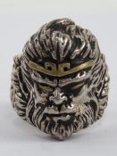 A large gothic style warrior head ring,
