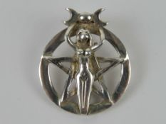 A silver Wiccan pentegram and mother pen