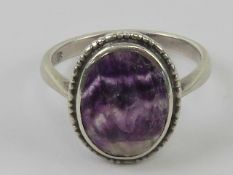 A silver Blue John cabachon ring, centra