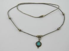 A 925 silver and opal pendant on Native