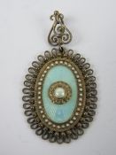 A Scandinavian enamel and silver pendant