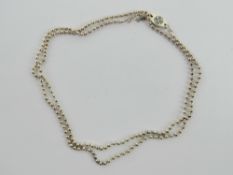 A silver bead chain, stamped 925 and dat
