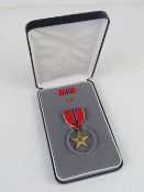 A US Vietnam War boxed Bronze Star.