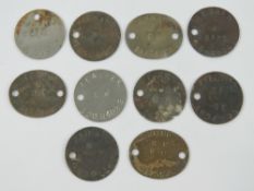 A quantity of Dog Tags. Ten items.