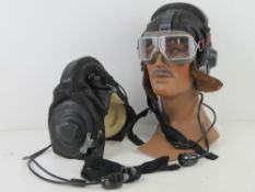 A Russian W3-82 flying helmet and goggles. Together with a Russian WA-78 flying helmet.