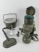 A German mess tin, together with a German gas mask, filter, tin and sling.