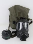 A Polish PM 070 gas mask and bag.