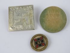 Three WWII German day badges.