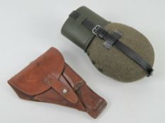 A German P38 holster together with a WWII German water bottle.