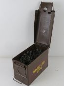 An Ammo tin containing a quantity of assorted machine Gun belt links.