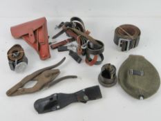 A quantity of assorted WWII German militaria inc; cutaway Bakelite bomb fuse.