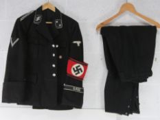 A replica WWII German SS tunic with Insignia , with trousers.