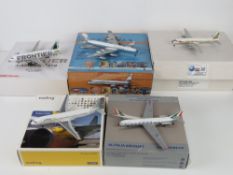 Five assorted model aircraft in original