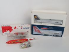 Two Airbus A380 scale model aircraft in