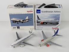 Two Scandinavian Airlines 1;200 scale mo