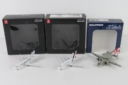 Two Falcon 2000 1;200 scale model aircra