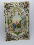 A decoupage Sweetheart or Valentines card, having lovers in central arch top garden scene with