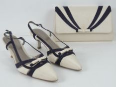 A pair of Jacques Vert purple and cream