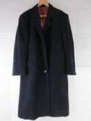 A men's wool and cashmere coat made in Italy, navy blue with burgundy lining approx 48