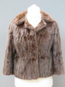 A vintage fur jacket bearing label for Smith & Sons Ltd Northampton,