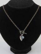 An HM silver necklace having T-bar clasp
