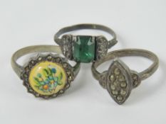 Two silver and marcasite rings and anoth