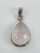 A rose quartz and silver teardrop shaped