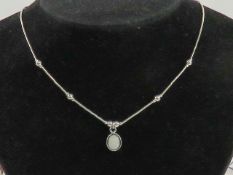 A 925 silver and opal pendant on Native