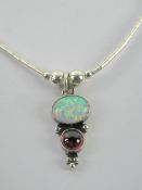 A 925 silver and opal pendant on Native