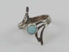 A blue larimar ring, white metal no appa