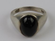 A mens HM silver and onyx cabachon ring,