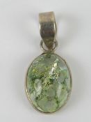 A pale green agate cabachon pendant, sta