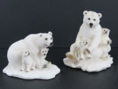 Two contemporary polar bear figurines, t