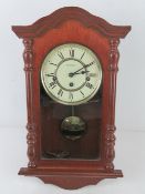 A contemporary H Samuel wall clock, 45cm