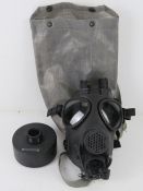 A Swiss SM90/M Gas mask and bag.