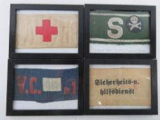 Four framed Arm bands.