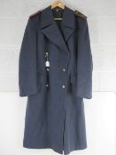 A blue post war German great coat.