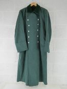 A reproduction WWII German Great Coat.