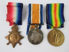 A 1914 Mons Medal Trio engraved for Pte. S. Woods Norfolk Regiment 6593.